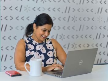 This image has the Element logo in the center surrounded by icons depicting the platform’s benefits. Background shows 5 people working together around a laptop.