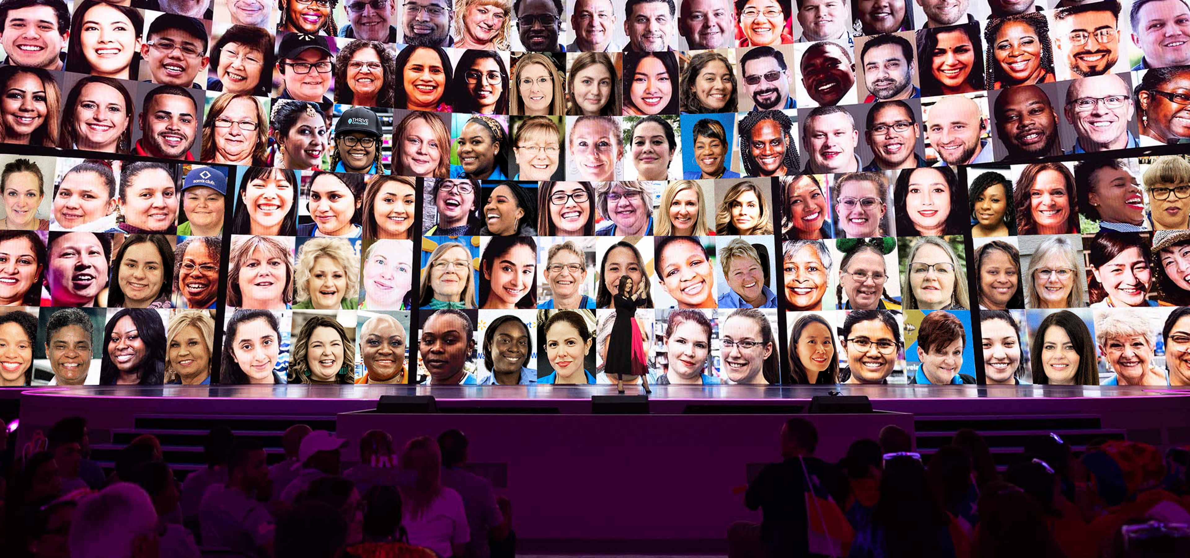 Photo of Judith McKenna on stage with a backdrop collage of dozens of Walmart associate faces. 