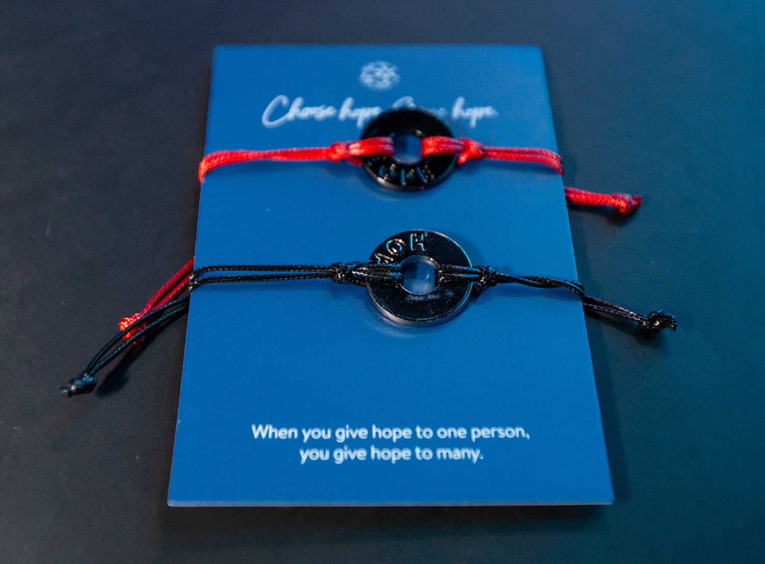 Red and blue "hope" bracelets given to International associates during the annual meeting